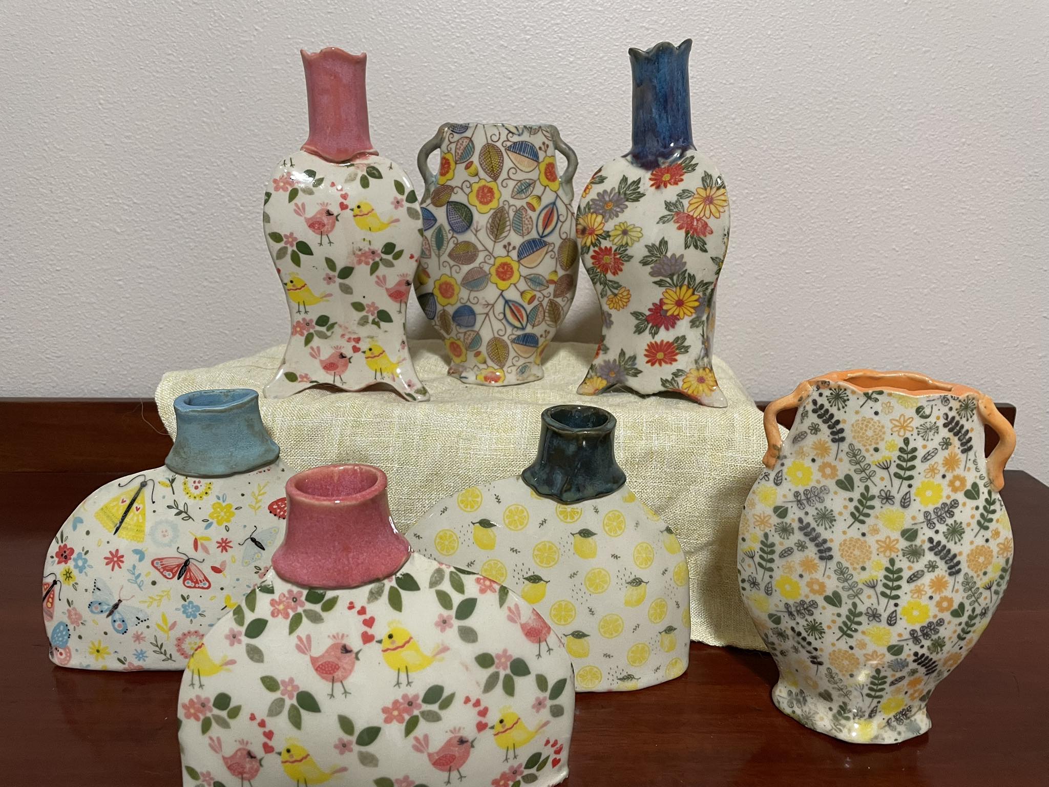 Handmade decorative ceramic vases with floral patterns