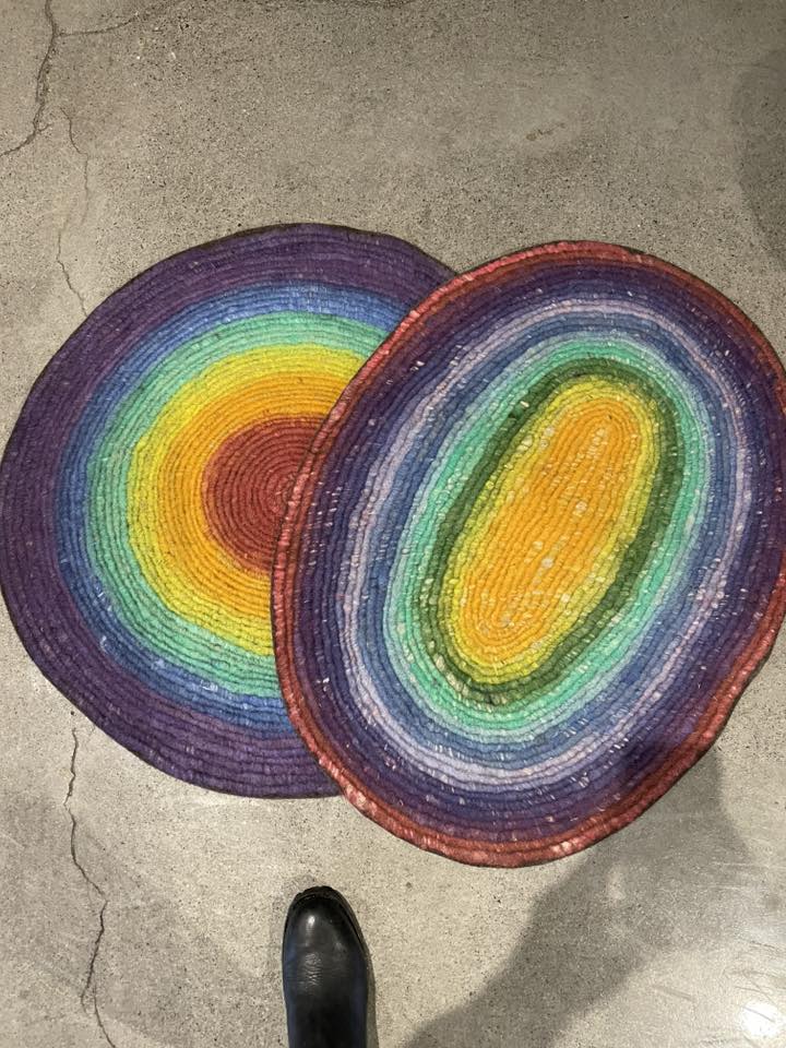 Rainbow braided rug handmade from recycled fibers