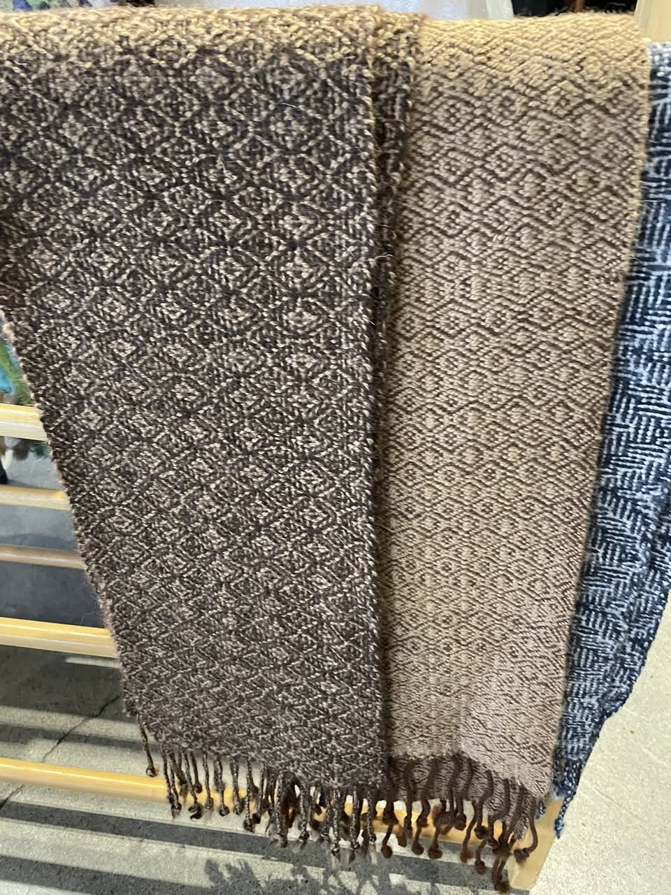 Handwoven alpaca fiber scarf in natural brown tones